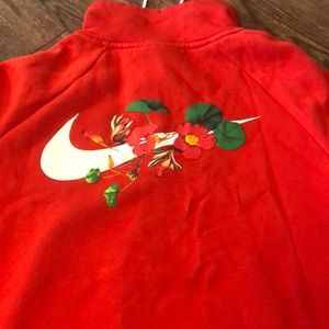 Flower Print NIKE quarterzip. LIGHT STAINING